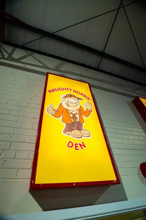 Naughty Norris's Den party room sign