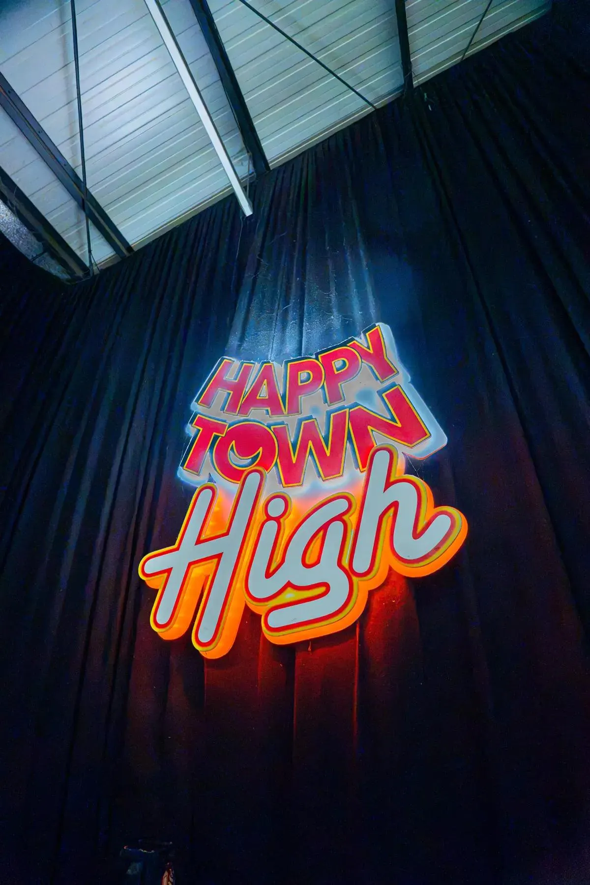 The Happy Town High stage sign